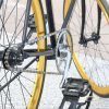 Bike wheels and pedal closeup