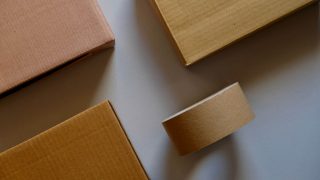 Cardboard boxes and other paper items on a table