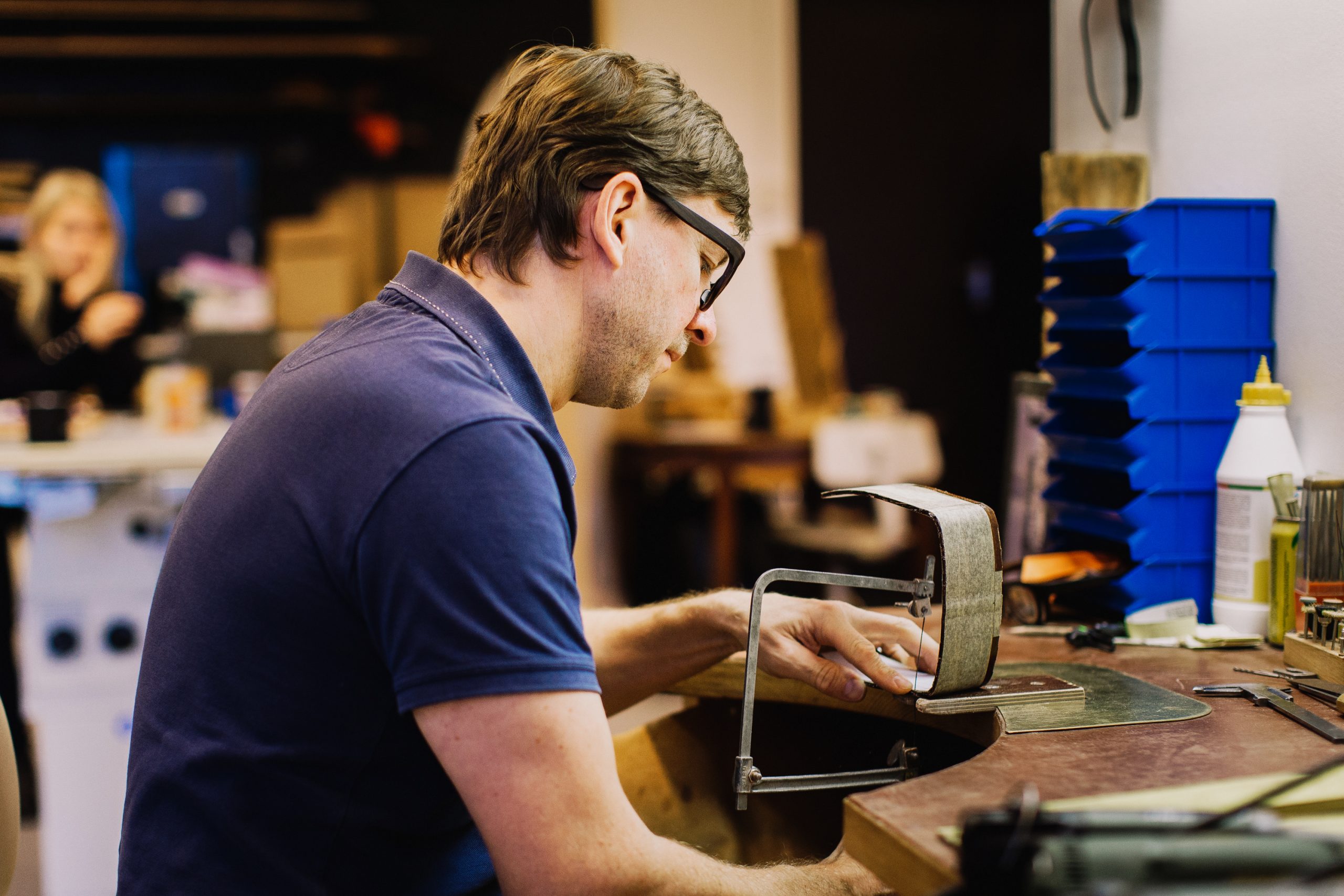 Skilled craft worker manufacturing glasses.