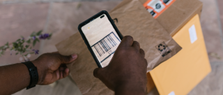 barcode scanner scanning a package
