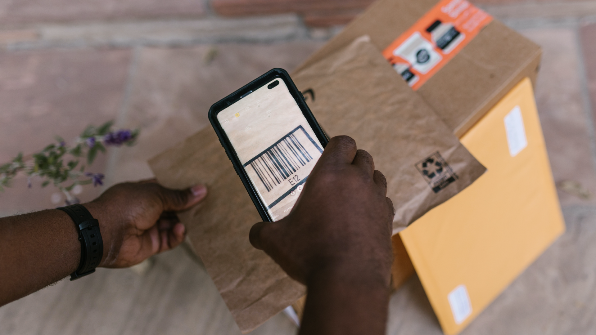 barcode scanner scanning a package