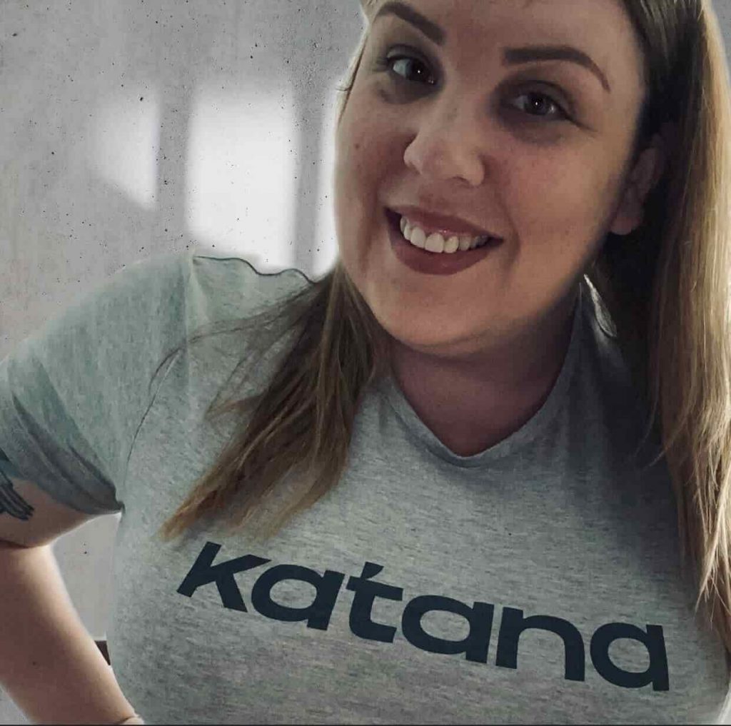 Christina posing with a Katana t-shirt.