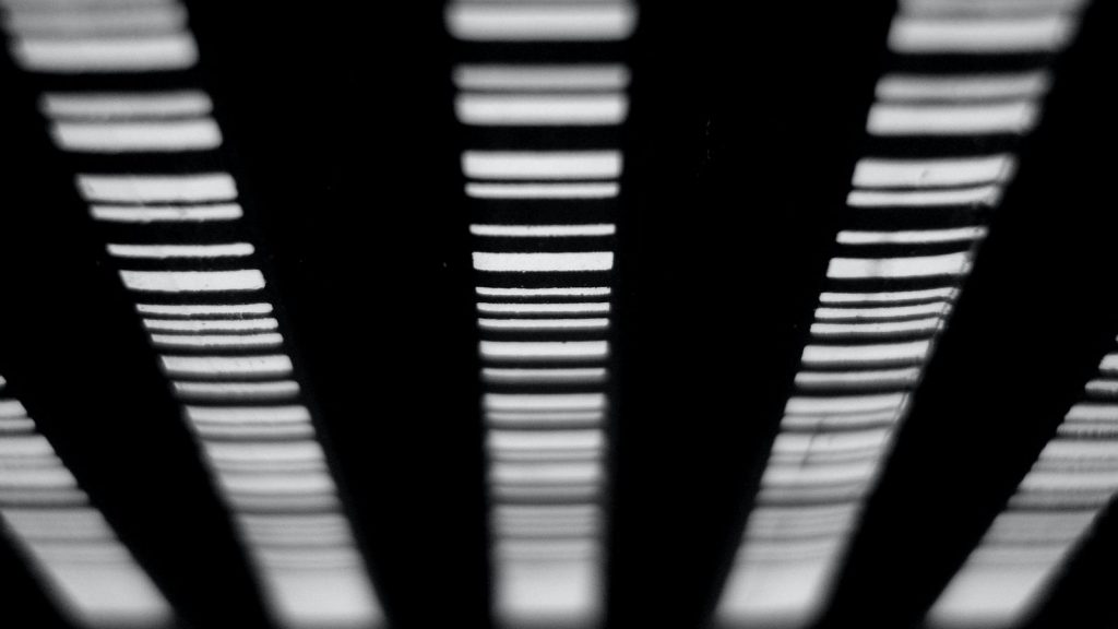 White barcode on a black background