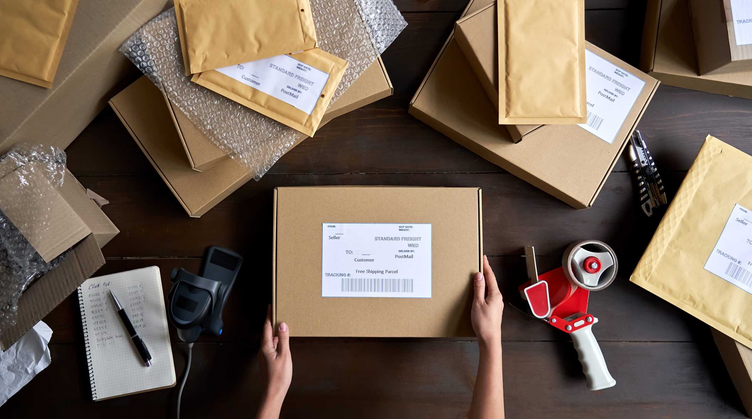 Cardboard packages on a desk from above