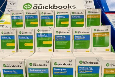 A display containing different versions of QuickBooks Desktop, the closest version to an ERP.