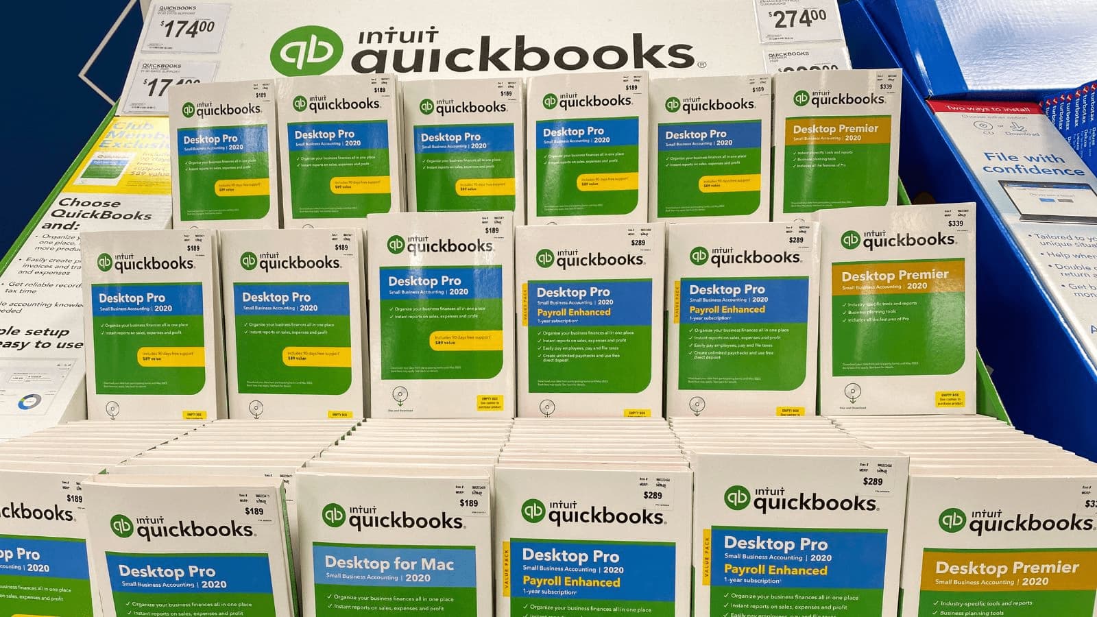 A display containing different versions of QuickBooks Desktop, the closest version to an ERP.