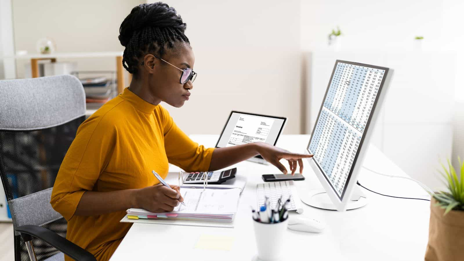 An accountant checking a business's e-commerce accounting.