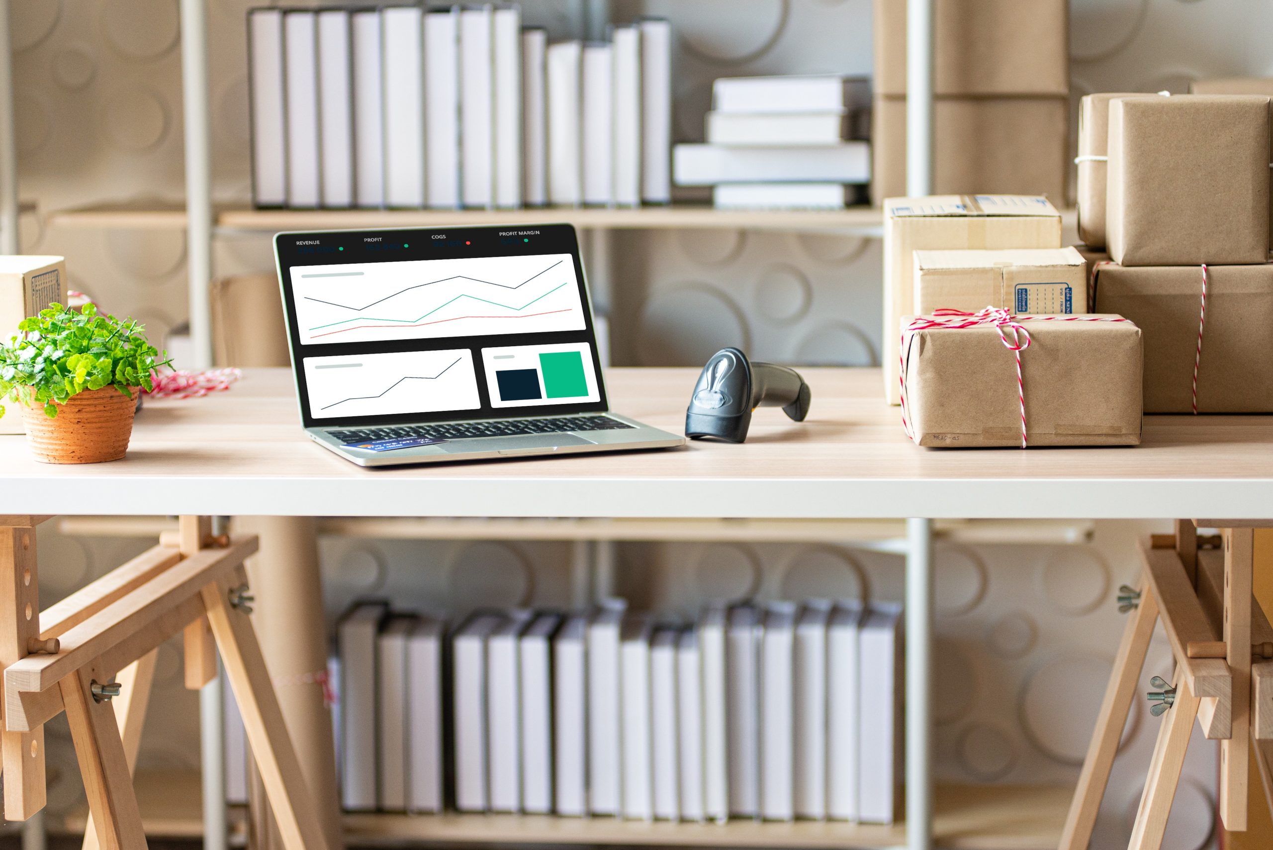 Laptop opened on a desk showing Katana's Insights