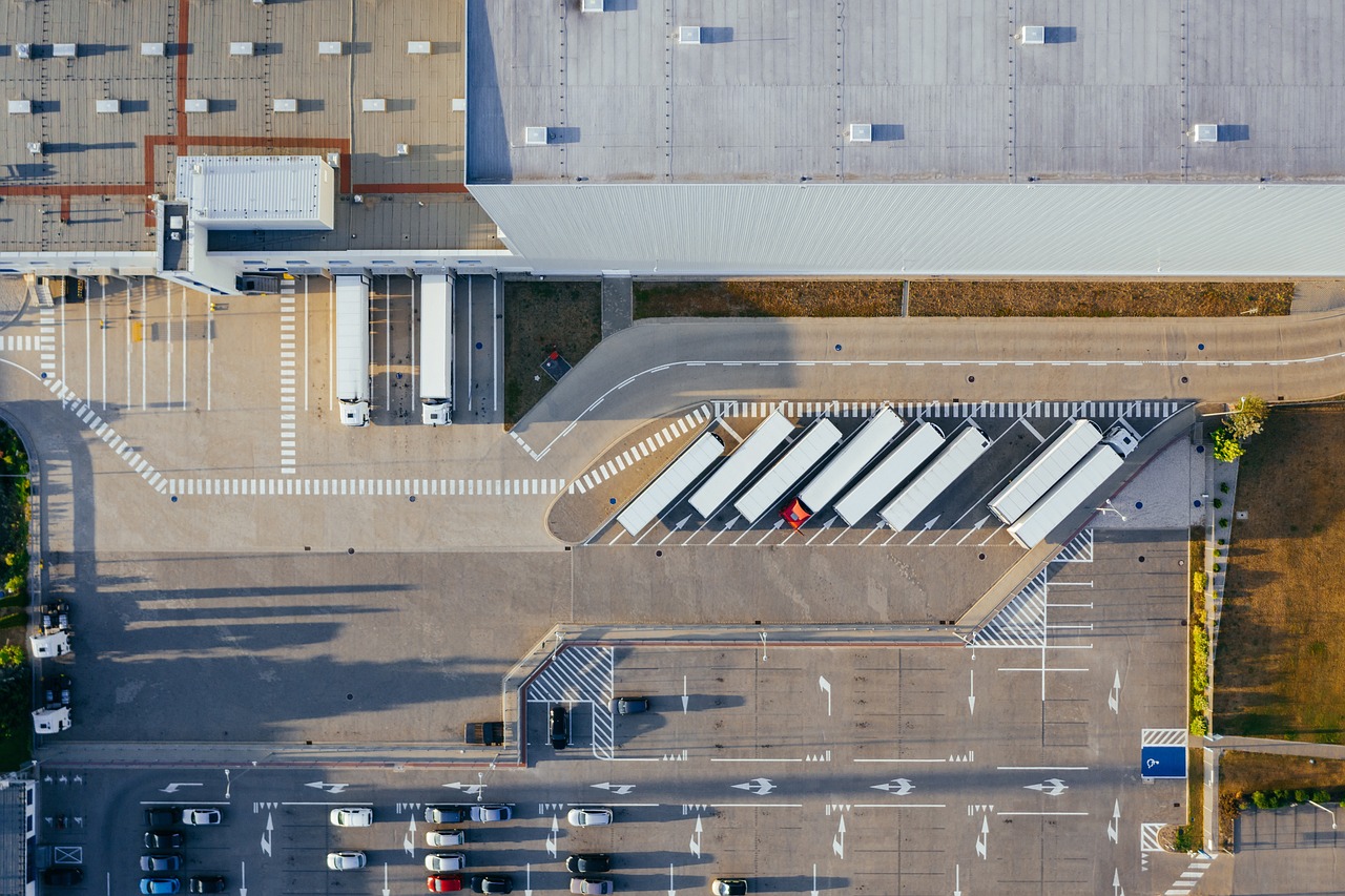 trucks in front of a warehouse