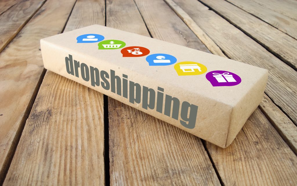 Dropshipping written on a box with colorful icons