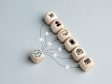 Wooden dice showing different omnichannel sales strategies
