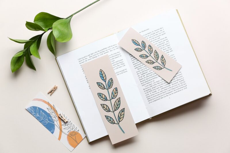 Bookmarks on a book  open on a table