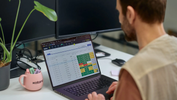 Team reviewing outsourced production and partner purchase orders in Katana on a laptop